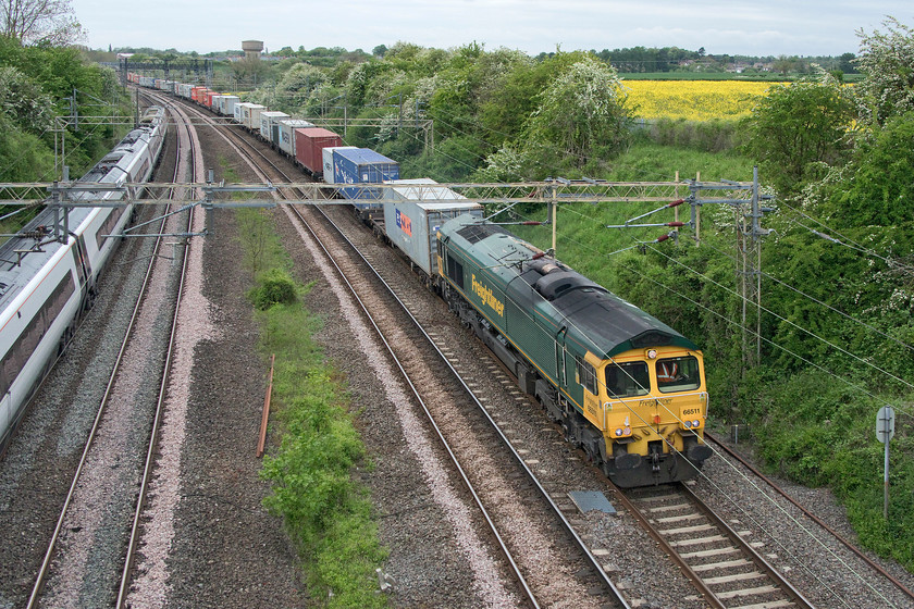 66511, 14.03 Ditton-Felixstowe North (4L92), Victoria bridge 
 Freight two at Victoria bridge is the 14.03 Ditton (Merseyside) to Felixstowe North Freightliner that came through fifteen minutes after the first one. This one is led by 66511, that arrived on these shores in August 2000 having made the journey across The Atlantic on MV Stellaprima arriving at Newport. 
 Keywords: 66511 14.03 Ditton-Felixstowe North 4L92 Victoria bridge