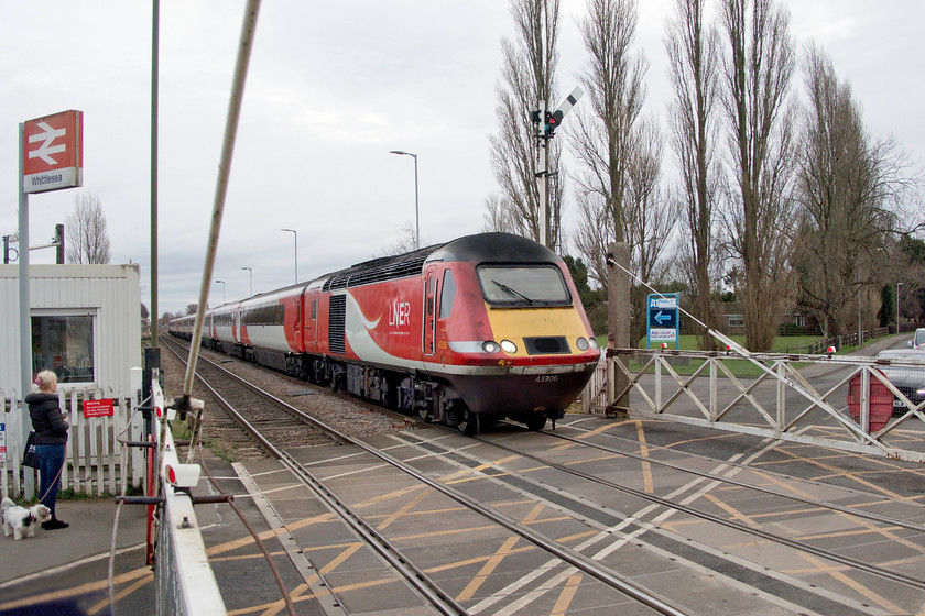 43306, GR 08.48 London KingsCross-Aberdeen (1S11, 4L), Whittlesea level crossing 
 At the front end of a down HST, power car 43306 looks a little tatty as it passes Whittlesea level crossing just east of Peterborough. 43306 has been an Eastern Region power car since it was introduced in 1979, initially as part of set 254027 so I suppose, now it's in the twilight of its working life, it can be expected to look a little worn around the edges! The HST is forming the 08.48 King's Cross to Aberdeen that has been diverted off the ECML due to engineering works. 
 Keywords: 43306 08.48 London Kings Cross-Aberdeen 1S11 Whittlesea level crossing