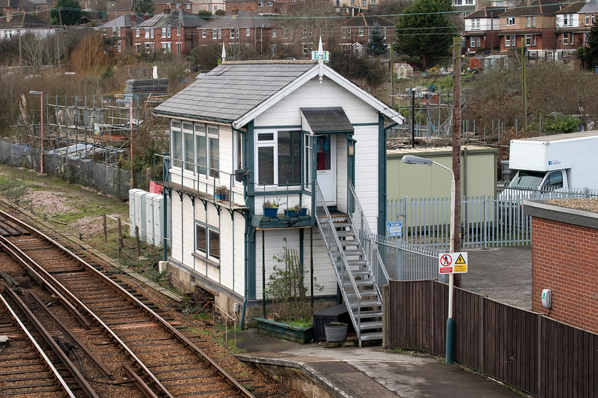 Ryde St. John`s Road signal box (SR, 1928) 
 Taken from the station footbridge Ryde St John's Road signal box is seen looking to be in very good condition. It was built in 1928 by the Southern Railway and was once one of a number of boxes on the Isle of Wight. It now controls all the signalling on the remaining 'mainline' route from Ryde to Shanklin. Older photographs taken from this angle reveal that the land behind the box, now occupied by a scaffolding company, was once a Southern Vectis bus station. 
 Keywords: Ryde St. John's Road signal box