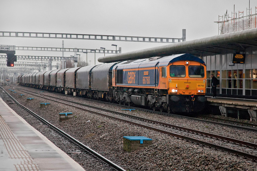 66760, 09.50 Grain Thamesport-Margam (6O23), Swindon station 
 667760 'David Gordon Harris' brings the 09.50 Thamesport to Margam 6O23 through Swindon. David Gordon Harris is a career train driver of many years and, after his son won the opportunity to name a GBRF 66 for a year he decided to name it after his father. 
 Keywords: 66760 6O23 Swindon station