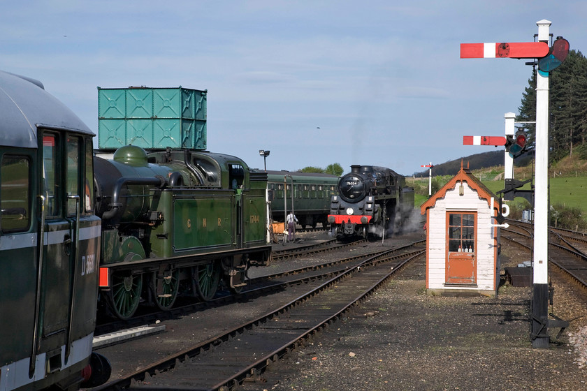 D5631, 1744, Class 101 DMU & 76034 (76084), Weybourne yard 
 And now the sun has finally come out! Having been plagued by some irritating high cloud drifting in from the North Sea the yard at Weybourne is now bathed by some warm late afternoon sunshine. In this view D5631 is seen stabled to the extreme left with Class N2 0-6-2T side tank locomotive 1744 just in front of it. In the background is one of the resident Class 101 DMUs whilst Class 4MT 76084 arrives in the yard after operating its trains for the day. The fire will be damped down, dropped and any service items attended to. It will then be prepared for further service tomorrow with a team arriving early in the morning to light the fire. 
 Keywords: D5631 1744 Class 101 DMU & 76034 Weybourne yard British Railways Standard Class 4MT 76084