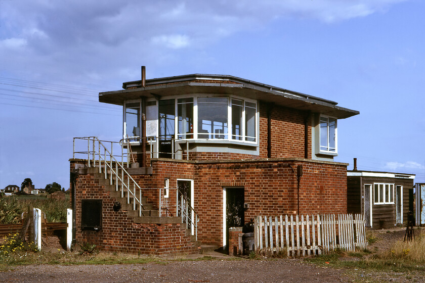 Murrow West signal box (BR, 1950) 
 The rear of Murrow signal box. The box was opened in 1950 by British Railways to an LNER design originally named Murrow West. It was located on the platform end of the station of the same name that was to close just three years later on 06.07.53. Thankfully, the signal box still survives as a private residence and what place it must be to live in! My 2023 image of the box can be seen here. https://www.ontheupfast.com/p/21936chg/30044473939/former-murrow-west-signal-box-lner 
 Keywords: Murrow West signal box LNER