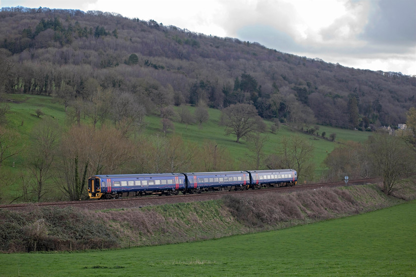 158953, GW 10.30 Cardiff Central-Portsmouth Harbour (1F21, RT), Avon Valley ST782652 
 Another shot where the sun had just dived behind a huge cloud! 159953 passes through the Avon Valley forming the 10.30 Cardiff Central to Portsmouth Harbour. The next stop for this train would be my old 'home' station of Bradford-on-Avon. 
 Keywords: 158953 1F21 Avon Valley ST782652