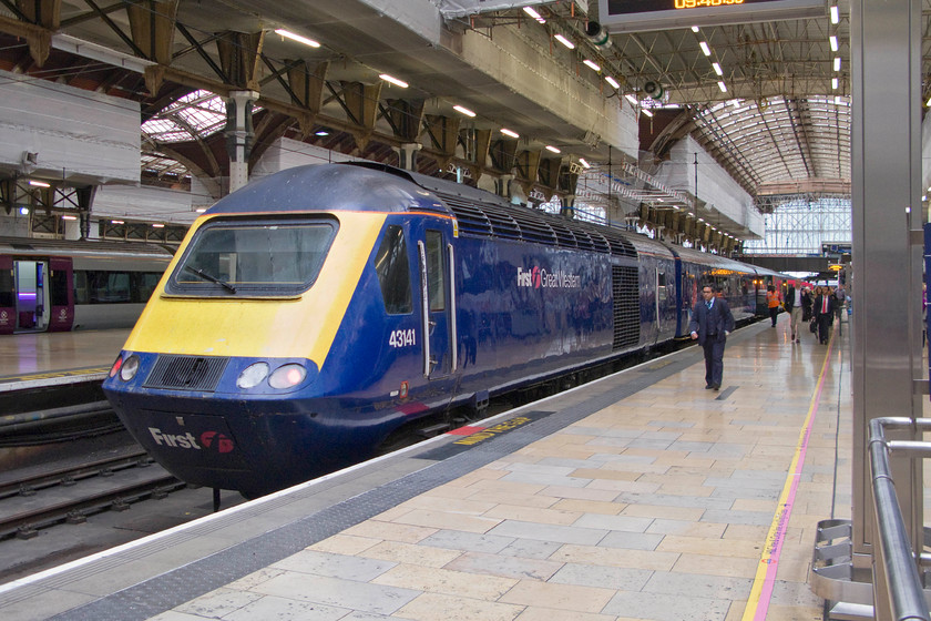 43141, GW 10.15 London Paddington-Cardiff Central (1B22), London Paddington station 
 HST power car 43141 sits at the rear of a service for the West Country. The train is occupying platform eight and in a short time, it will leave working the 1B22 10.15 to Cardiff Central. 
 Keywords: 43141 10.15 London Paddington-Cardiff Central 1B22 London Paddington station First Great Western FGW