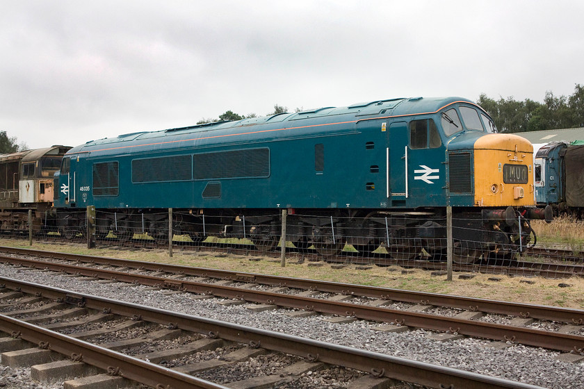 58022 & 46035, stabled, Rowsley South 
 With Project 'Icon's' 58022 putting in an appearance 45035 looks considerably smarter! However, looks can be deceiving. The Peak, that was formally owned by Pete Waterman, has been moved here from Crewe's Railway Age has an uncertain future. Let's hope somebody can take it on and that it will run once again. 
 Keywords: 58022 46035 Rowsley South