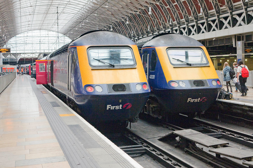 43140, GW 15.00 London Paddington-Bristol Temple Meads (1C199) & 43131, GW 14.45 London Paddington-Swansea (1B46), London Paddington station 
 Two HSTs stand side by side at Paddington as they have done for forty years! 43140 to the left will work the 15.00 to Bristol Temple Meads whilst, to the right, 43131 will soon leave with the 14.45 to Swansea. 
 Keywords: 43140 15.00 London Paddington-Bristol Temple Meads 1C199 43131 14.45 London Paddington-Swansea 1B46 London Paddington station