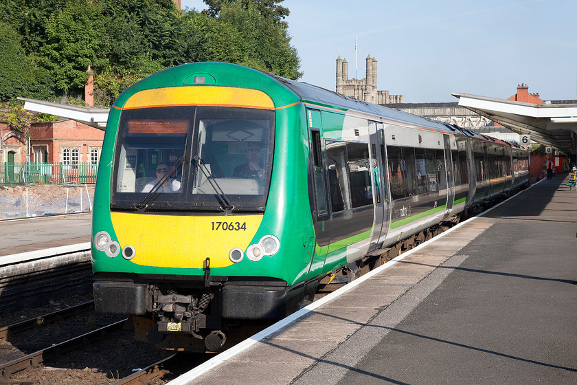 170634, 08.47 Shrewsbury-Birmingham New Street (1G13), Shrewsbury station 
 London Midland's 170634 leaves Shrewsbury's bay platform six with the 08.47 to Birmingham New Street. The Tudor style clock tower is seen above the train. When this, and the facade was designed and constructed it was intended to mirror the frontage of Shrewsbury School (now the library) that is directly opposite. 
 Keywords: 170634 08.47 Shrewsbury-Birmingham New Street 1G13 Shrewsbury station