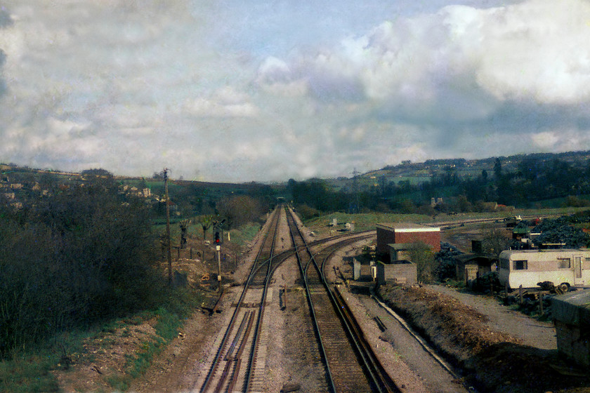 Bathampton Junction looking east 
 The view looking eastwards from the over bridge at Bathampton Junction. Straight ahead is the mainline to Paddington. Curving off to the right is the line to Westbury that is about to head along the glorious Avon Valley. The remains of the old station platforms can be made out in this view. Also, the location of the old signal box can be made out. It was a BR structure dating from the 1950s and was sited on the brown earthen area just behind the signal post on the left. 
 Keywords: Bathampton Junction Bath