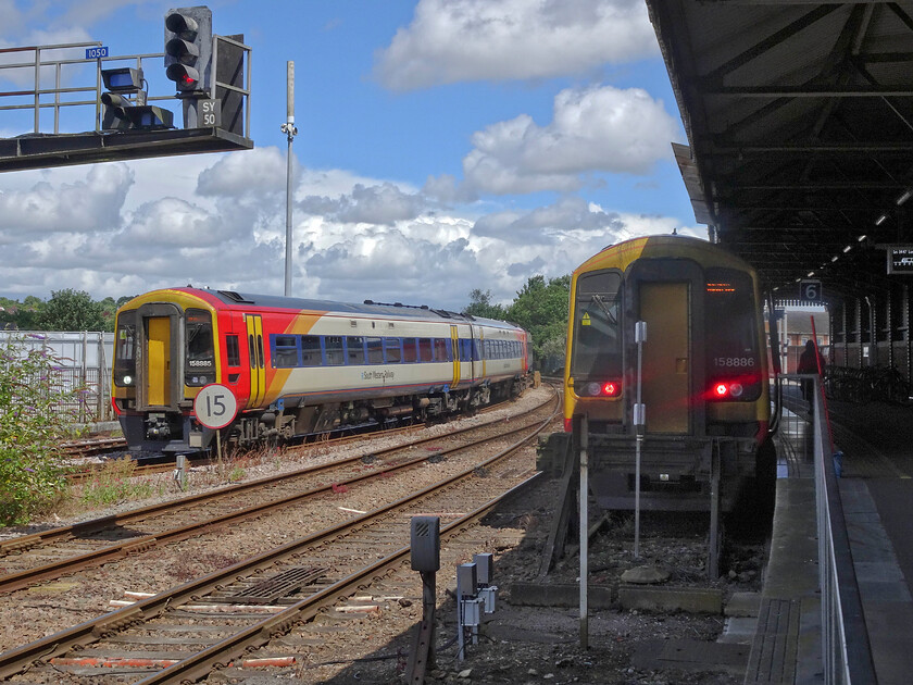 158885, SW 13.08 Romsey-Salisbury (1L35, 2L) & 158886, SW 14.47 Salisbury-London Waterloo (Cancelled from Basingstoke) (1L50, 1L), Salisbury station 
 158885 arrives at Salisbury station with the 13.08 local service from Romsey. Meanwhile, to the right 158886 will work the 14.47 service to Waterloo. This train was cancelled from Basingstoke with passengers forced to change to other services to complete their journeys to London. 
 Keywords: 158885 13.08 Romsey-Salisbury 1L35 158886 14.47 Salisbury-London Waterloo Cancelled from Basingstoke1L50 Salisbury station