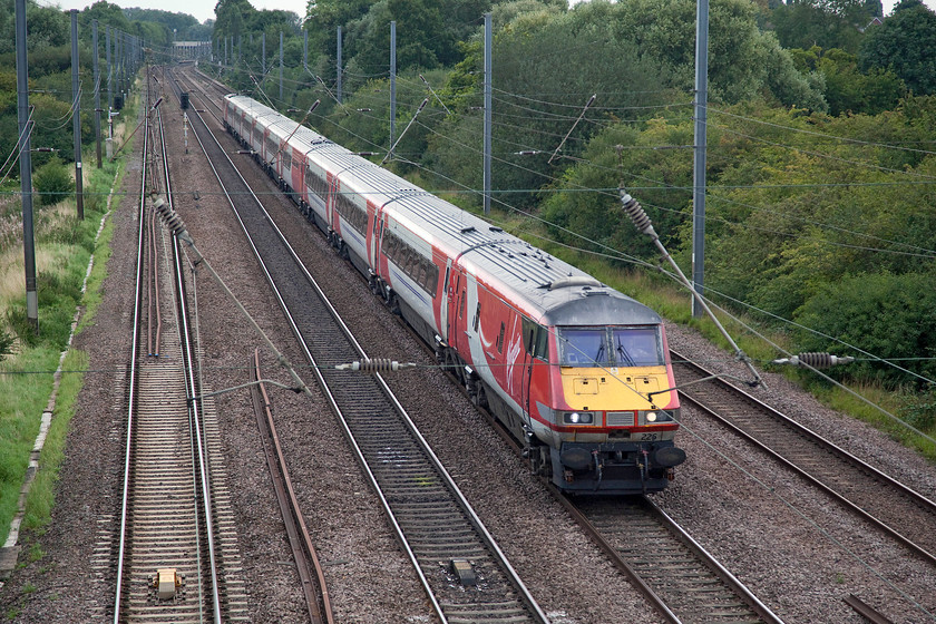 82226 & 91103, GR 06.30 Newcastle-London Kings Cross (1Y11, 18L), Arlesey TL189364 
 82226 leads with 91103 pushing at the rear of the 06.30 Newcastle to King's Cross. It is about to pass under Arlesey's Co-op bridge with the station just visible in the very distance. 
 Keywords: 82226 91103 1Y11 Arlesey TL189364