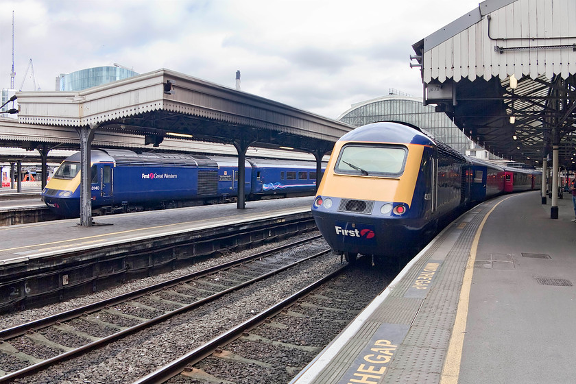 43140, GW 14.30 London Paddington-Swansea (1B46, 15L) & 43030, 14.57 London Paddington-Bristol Temple Meads (1U19, 10L), London Paddington station 
 Two HSTs wait to leave the capital for the West Country. To the left is 43140 'Landore Diesel Depot 1963 Celebrating 50 years 2013/Depo Diesel Glandwr 1963 Dathlu 50 Mlynedd 2013' leading the 14.30 to Swansea and to the right, 43030 on the 14.57 to Bristol Temple Meads. 43140 was part of a third batch delivered to the Western Region as part of set 253035 where as 43030 was an early 1976 power car delivered as part of set 253015. 
 Keywords: 43140 1B46 43030 1U19 London Paddington station