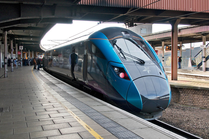 802212, TP 10.02 Newcastle-Liverpool Lime Street (9M08, 35L), York station 
 Just look at the shine in the nose cone of TransPennine Express' Nova 1 as it reflects York station! Five-car 802212 pauses at the station forming the 10.02 Newcastle to Liverpool Lime Street. This is my first photograph of one of their new smart new units that their web site says are called Nova because.... 'We wanted to give our trains a name that reflects the positive changes and explosion of energy that will truly transform rail travel for customers and so, they are known as our Nova fleet. The word represents what we are trying to achieve over the next few years, embodying fast-paced energy and change as we take the North further together'......hmm? 
 Keywords: 802212 10.02 Newcastle-Liverpool Lime Street 9M08 York station Azuma TPE TransPennine Express