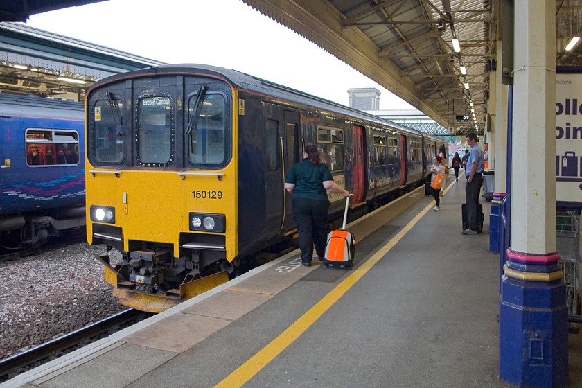 150129, GW 19.17 Barnstaple-Exeter Central (2R96, 3L), Exeter St. David's station 
 150129 pauses at Exeter St. David's station with the 19.17 Barnstable to Exeter Central working. Andy and I took this train the short distance up the hill to Central station. From there we sought out a curry house for a much needed evening meal. 
 Keywords: 150129 2R96 Exeter St. Davids station