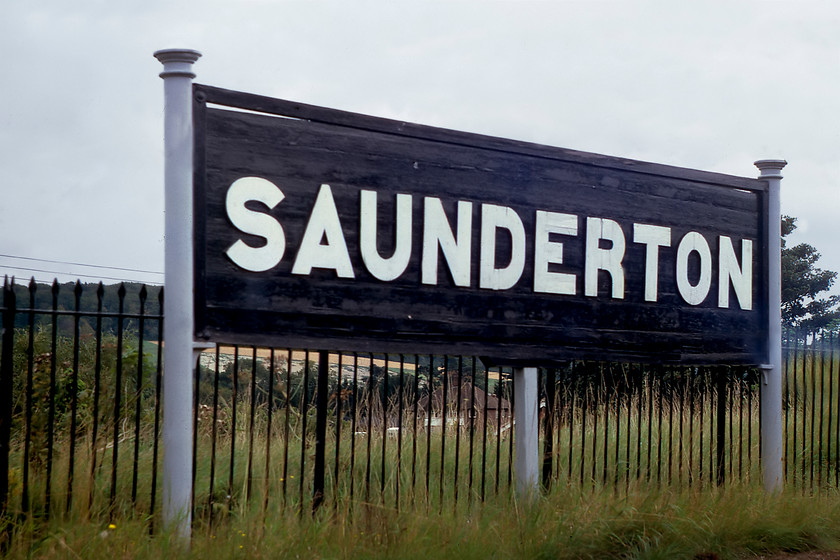 Running in board, Saunderton station 
 Looking as though it has a had a recent coat of paint but looking a little down on its luck is the rather grand running in board on Saunderton station. This was a common design to the GWR with examples found all over with some actually still in use today but I am not absolutely sure of the providence of the example at Torre, see.. https://www.ontheupfast.com/p/21936chg/24745327604/running-boards-bench-torre-station 
 Keywords: Running in board Saunderton station GWR