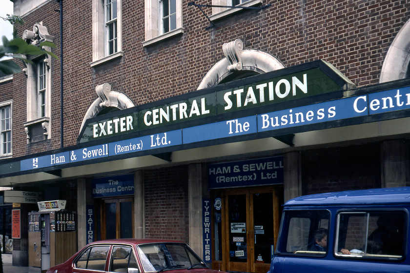 SR sign, Exeter Central station 
 I photographed the impressive frontage at Exeter Central station a few weeks previously, see....... https://www.ontheupfast.com/p/21936chg/29441750204/frontage-exeter-central-station but on my return this time I photographed the former Southern Railway sign above the canopy. The office supplier Ham and Sewell are still in business today (2020) but trading from a shop in Plymouth's Armada Centre rather than from Exeter as here in 1980. 
 Keywords: SR sign Exeter Central station