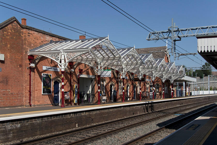 Reinstalled canopy, Wellingborough station 
 When Wellingborough station was being dragged into the twenty-first century a couple of years ago the canopies were removed to aid the installation of the AC electrification paraphernalia but also because they were found to be in a parlous state. At the time I made a comment about what exactly was going on and the way that the work was gone about, see.... https://www.ontheupfast.com/p/21936chg/28700323804/platform-1-wellingborough-station However, I am pleased and quite ready to admit that my concerns were unfounded and that a super job has been completed to reinstate the Midland style canopies and to a very high standard; credit where it's due! 
 Keywords: Reinstalled canopy Wellingborough station.