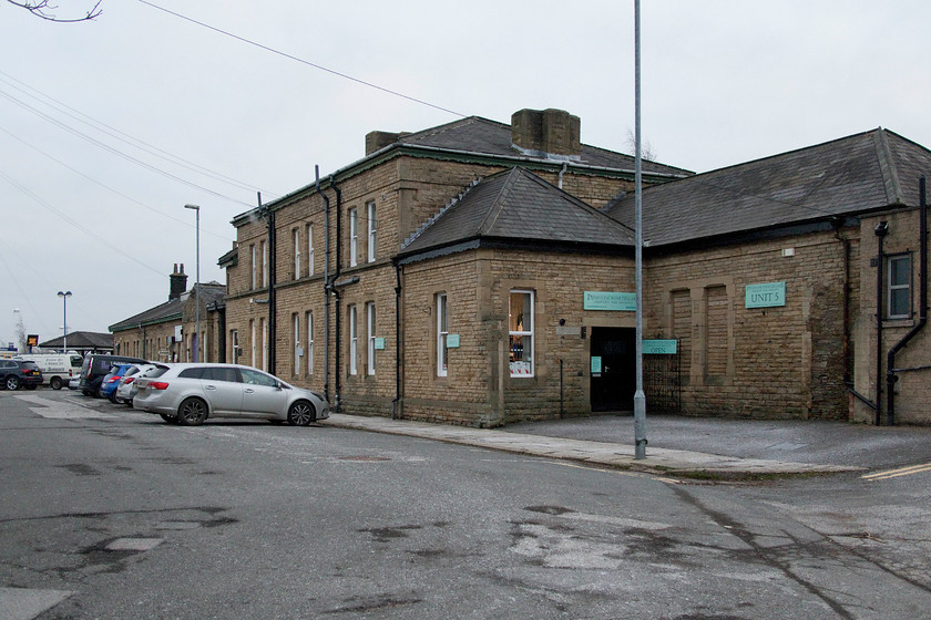 Frontage, former-Pesntone station 
 The large station buildings at Penistone have not seen any railway use since the Woodhead route line was closed to passengers in January 1970. A number of businesses now occupy the building that was built by the Great Central in 1874. 
 Keywords: Penistone station