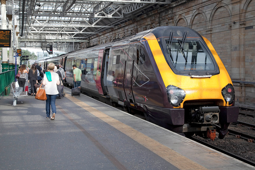 221123, XC 17.08 Edinburgh Waverley-Birmingham New Street (1M80), Edinburgh Waverley station 
 Passengers board 221123 that will soon work CrossCountry's 17.08 to Birmingham New Street that will head east before heading south down the east coast to towards Newcastle. 
 Keywords: 221123 17.08 Edinburgh Waverley-Birmingham New Street 1M80 Edinburgh Waverley station