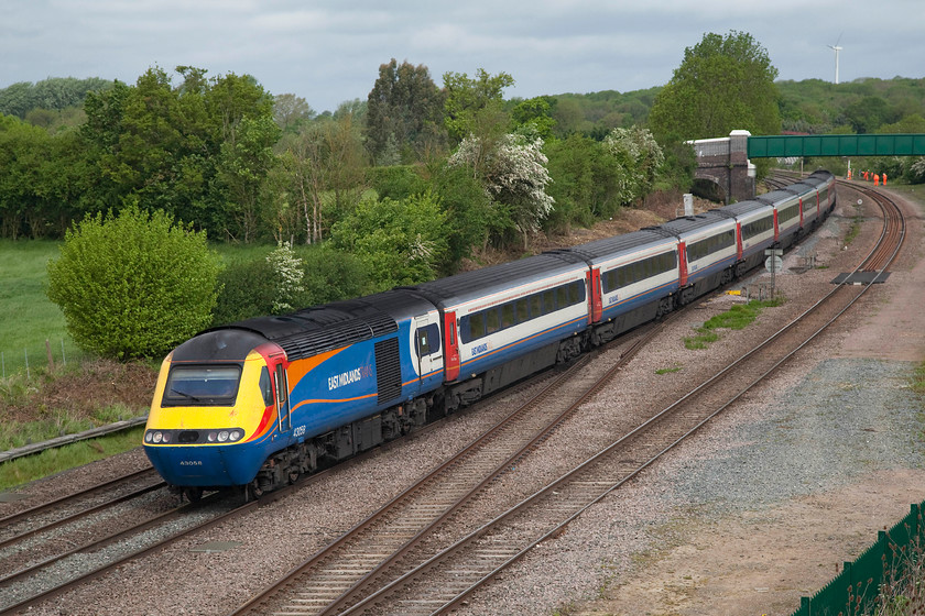 43058 & 43045, EM 07.46 Sheffield-London St. Pancras (1C22, RT), Templars Way Bridge, Sharnbrook 
 An East Midland's HST with power cars 43058 and 43045 descend from Sharnbrook Summit with the 07.46 Sheffield to St. Pancras The picture is taken from Templars Way Bridge in Sharnbrook village. Like the bridge in the background, the one I'm standing on has had major engineering completed to make it ready for the on-off-on electrification programme. 
 Keywords: 43058 43045 1C22 Templars Way Bridge Sharnbrook