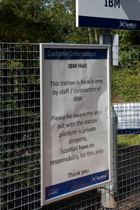 Passenger notice, IBM station 
 Using a combination of common sense, an Ordnance Survey map and Google Earth, Andy and me managed to find IBM station! But, as you can see from this notice, we would not have been able to actually use it! For a single platform station usage numbers were once very impressive at 0.123 million but that has declined to a number very close to zero for this year! It was constructed to serve the employees of the adjacent IBM factory that finally closed in 2016. As it performs no other purpose, being fairly high up on the side of Spango Valley about two miles south west of Greenock, its future is in question. However, there could be a future if the IBM site is transformed into a mixture of housing, retail and industrial use as is a proposal at the moment. 
 Keywords: IBM station