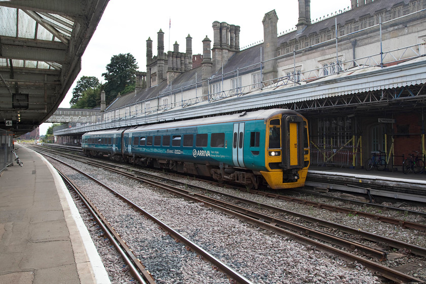 158839, AW 12.30 Aberystwyth-Shrewsbury (1J40), Shrewsbury station 
 158839 comes to a halt at Shrewsbury having worked the 12.30 from Aberystwyth. This picture gives an impression of the mock Tudor architecture that is such a feature of Shrewsbury's grand station. As can be seen, it is undergoing an extensive renovation programme. 
 Keywords: 158839 12.30 Aberystwyth-Shrewsbury 1J40 Shrewsbury station