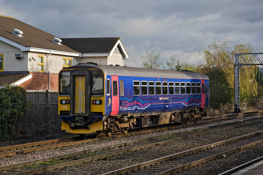 153372, ECS movement, Gloucester station 
 Under a dramatic winter's sky, one of FGW's single-car Class 153 units makes an empty coaching stock move in and then out of Gloucester station. These versatile units are useful in that they can easily be used to supplement other units when loadings dictate. 
 Keywords: 153372 ECS movement Gloucester station FGW First Great Western