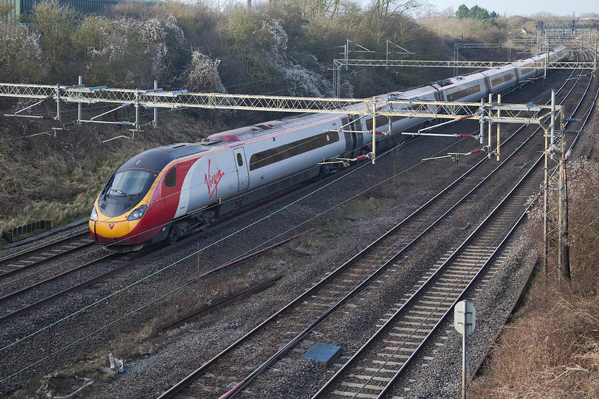 390044, VT 09.40 Glasgow Central-London Euston (1M10, 3L), Victoria Bridge 
 The 1M10 09.40 Glasgow Central to Euston passes Victoria Bridge on the southern WCML with just 60 of its 400 mile journey to complete. The train is formed by 390044 that is now un-named having previously been 'Virgin Lionheart'. 
 Keywords: 390044 09.40 Glasgow Central-London Euston 1M10 Victoria Bridge