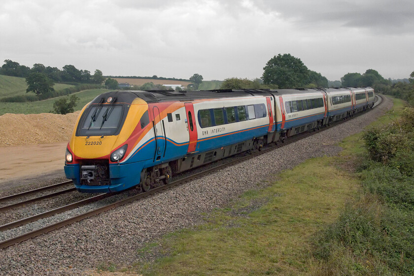 222020, EM 07.05 London St. Pancras-Nottingham (1D11, 2E), Braybrooke SP769849 
 With a worksite associated with the forthcoming electrification of this section of line in the background 222020 heads north working EMR's 07.05 St. Pancras to Nottingham 1D11 service. The train is seen on an incredibly dull August morning passing near the Northamptonshire village of Braybrooke a short distance south of Market Harborough. 
 Keywords: 222020 07.05 London St. Pancras-Nottingham 1D11 Braybrooke SP769849 EMR Meridian