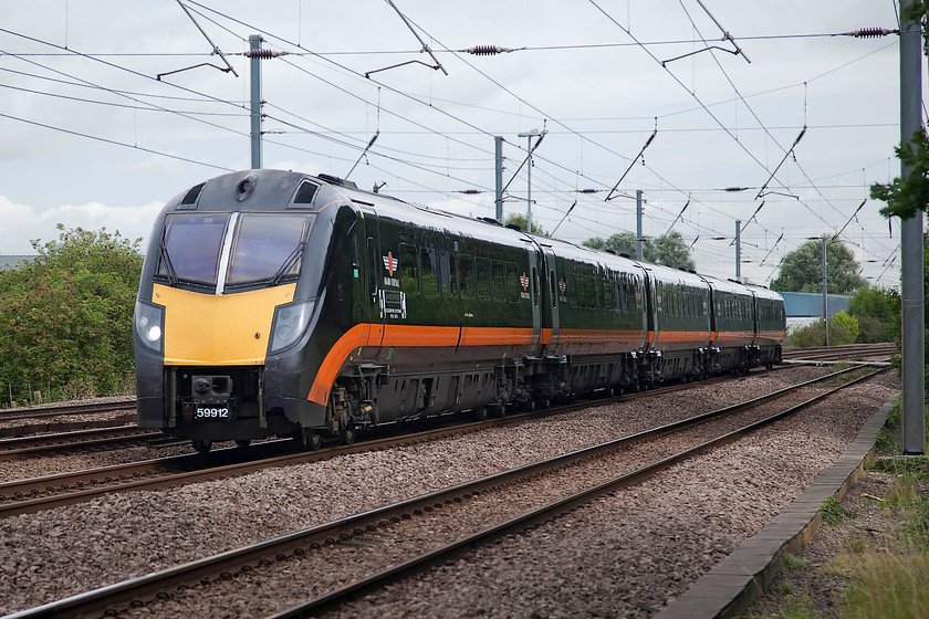 180112, GC 06.45 Sunderland-London Kings Cross (1A60, RT), Gills Crossing 
 180112 'James Herriot' heads south working the 06.45 Sunderland to King's Cross service past Offord Cluny just south of Huntingdon. According to their website, Grand Central named this class 180 as it 'builds on the partnership between Grand Central Railway and the World of James Herriot and the Herriot Country Attractions Group, who bring many thousands of visitors into the beautiful parts of Yorkshire around Thirsk.' Shame that this service started from Sunderland then! 
 Keywords: 180112 1A60 Gills Crossing