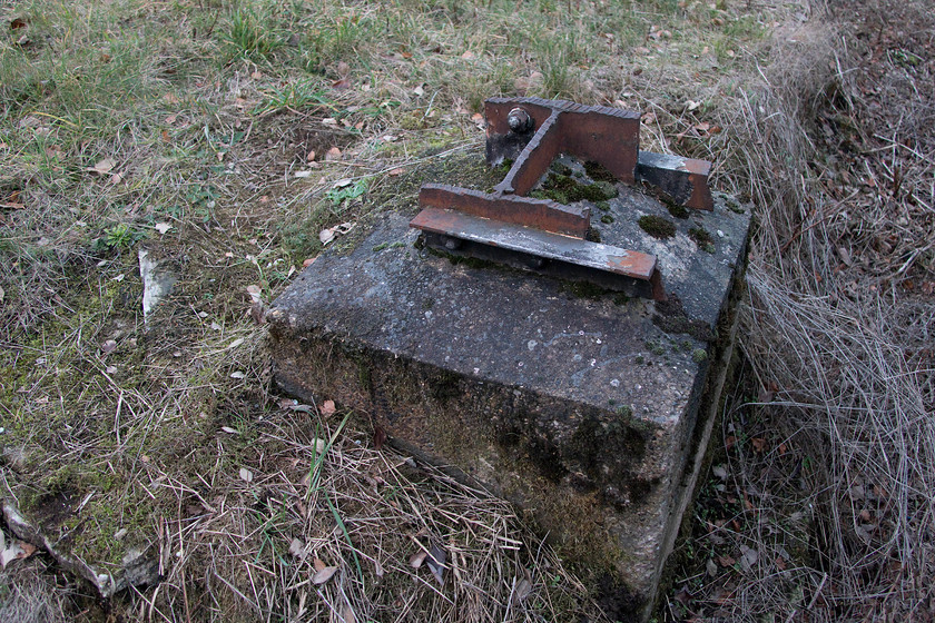 Former electrification post, Penistone station 
 On the former platform ramp at Penistone station is the remains of an electrification mast. It has been crudely flame cut when all the infrastructure was removed following its closure in July 1981. However, removal and disposal of the assets did not get completed for a number of years so it is likely that this particular mast stood serving no purpose for some time. 
 Keywords: Penistone station