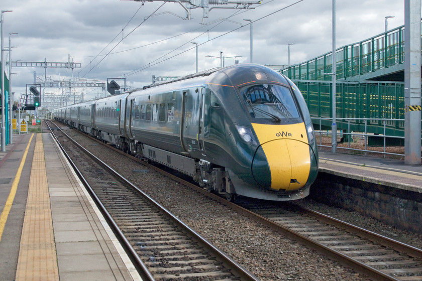 800007 & 800015, GW 12.45 London Paddington-Swansea (1B35, 3E), Severn Tunnel Junction station 
 Taken the wrong side of the light but taken with a particular thought in mind, 800007 and 800015 passes through Severn Tunnel Junction with the 1B35 12.45 Paddington to Swansea service. This very 'fussy' view contrasts with a photograph that I took of an HST in a very similar spot back in 1977, see.... https://www.ontheupfast.com/v/photos/21936chg/23615758404/my-friend-spotting-companion-richard. However, I think that the older picture was taken on the island platform to the right of me in this image, the new platform three. 
 Keywords: 800007 800015 12.45 London Paddington-Swansea 1B35 Severn Tunnel Junction station