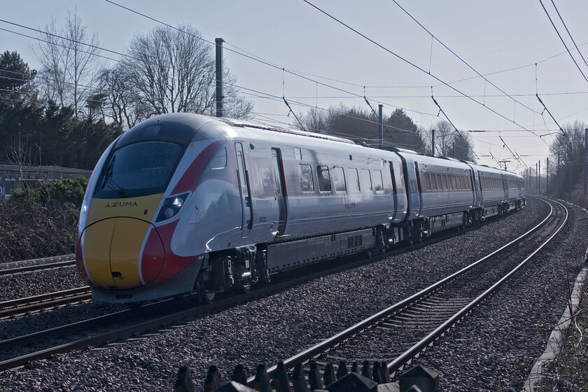 800203, GR 12.30 London King's Cross-Edinburgh Waverley (1S17, 1L), Arlesey station 
 Taken very much against the light but 800203 strikes quite a pose as it takes the sharp and suitable cambered curve at Arlesey station working the 12.30 King's Cross to Edinburgh express. At thirty-seven miles from King's Cross Arlesey station in its present state was opened on 03.10.88 following its closure nearly thirty years earlier. With its wide-open views of the busy ECML and its curves it offers some splendid photographic opportunities but beware of the lighting! 
 Keywords: 800203 12.30 London King's Cross-Edinburgh Waverley 1S17 Arlesey station LNER Azuma