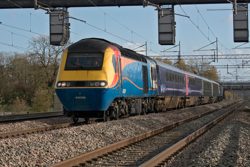 43059, 13.56 Rugby-Crewe HS (5Z45, 3E), Cathiron SP4667783 
 Having just had a fast run up the WCML from Carnforth to Rugby the crew executed a rapid change of ends and this HST test train is seen again at Cathiron returning north to Crewe now running as 5Z45. Now former EMT 43059 is leading the four former FGW/GWR coaches with 43058 at the rear. The train was undertaking a number of proving runs prior to LSL preparing the train for the charter market, whenever COVID permits! There is much chatter on the forums that this set will also be painted as a Blue Pullman set like the one just released from Eastleigh's Arlington facility that looks superb. However, I think that these unashamedly retro sets would look better with buffer beams like the few that had them fitted as surrogate DVTs for work on the ECML. I wish LSL all the best with its efforts and hope that it, and all the other charter operators for that matter, comes through these incredibly taxing times. 
 Keywords: 43059 13.56 Rugby-Crewe HS 5Z45 Cathiron SP4667783 HST EMR EMT FGW GWR LSL