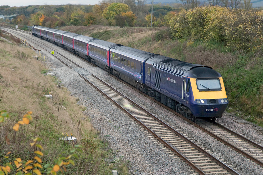 43036 & 43182, GW 13.15 London Paddington-Cardiff Central (1B37), Bourton SU234875 
 43036 and 43182 provide the power for the 13.15 Paddington to Cardiff Central 1B37 working. It is seen passing Bourton a short distance east of Swindon. Notice the evidence of works and the 80mph temporary speed restriction associated with the preparations for the electrification process that will ruin this superb view from the quiet occupation bridge. 
 Keywords: 43036 43182 13.15 London Paddington-Cardiff Central 1B37 Bourton SU234875