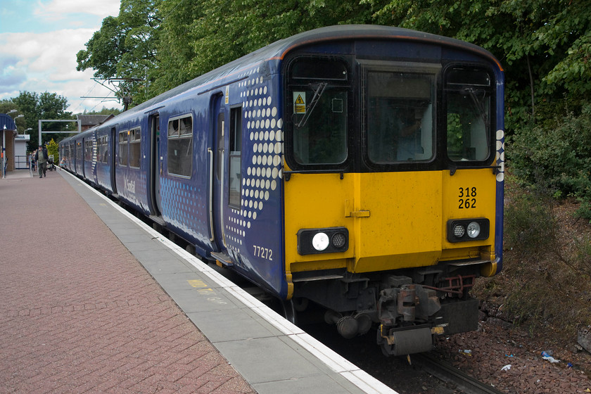 318262, SR 15.37 Balloch-Airdrie (2E66, 9L), Balloch station 
 318262 sits at the buffer stops at the single platform Balloch station waiting to work the 15.37 to Aidrie. Andy and took this working from Balloch to Dumbarton Central a short distance of about five miles. 
 Keywords: 318262 2E66 Balloch station