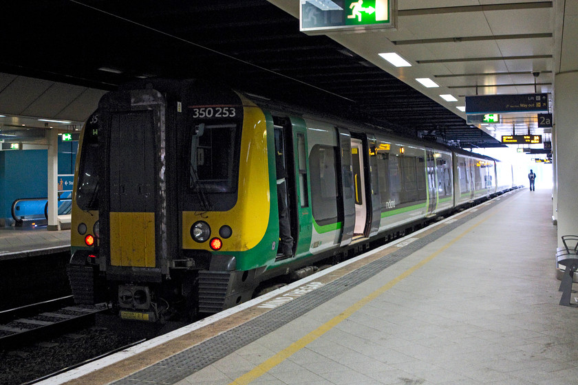 350253, LM 08.50 Wolverhampton-Walsall (2A11), Birmingham New Street station 
 350253 sits in the gloom of New Street station working the cross-Birmingham 2A11 08.50 Wolverhampton to Walsall service. Despite the much heralded work carried out rebuilding New Street, the platforms remain rather cramped and very uninviting. I suppose that there is only so much tat you can do with a station that is almost completely underground? 
 Keywords: 350253 08.50 Wolverhampton-Walsall 2A11 Birmingham New Street station