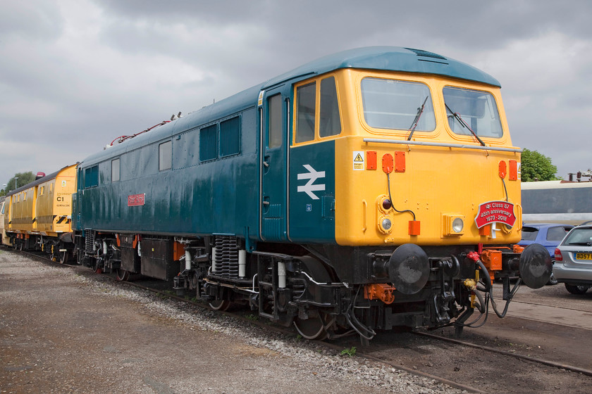 87035, on-display, Crewe Heritage Centre 
 87035 'Robert Burns' stands, in its BR blue livery, at the Crewe Heritage Centre. This October 1974 locomotive was retired by Virgin West Coast in 2005 and then moved to it new home at the Crewe Heritage Centre. 
 Keywords: 87035 Crewe Heritage Centre