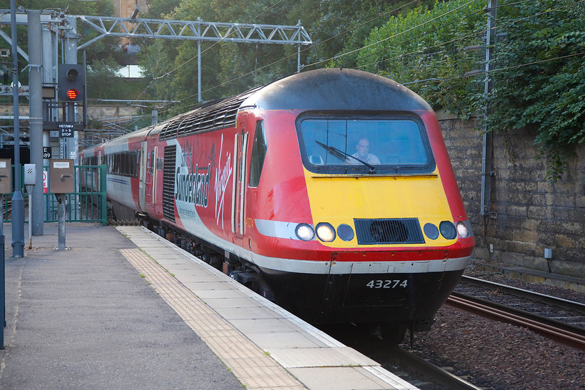 43274, GR 14.52 Aberdeen-London King`s Cross (1E25), Edinburgh Waverley station 
 43274 'Spirit of Sunderland' emerges from Mound Tunnel as it enters Edinburgh Waverley station leading the 14.52 Aberdeen to King's Cross HST service. Travelling on an HST along the north east coast of Scotland and then down the ECML is a lovely way to enjoy a long and scenic railway journey. I hope that the new IETs, to be introduced in the next few years, are a worthy and appropriate replacement for these veterans of the rails. 
 Keywords: 43274 14.52 Aberdeen-London King`s Cross 1E25 Edinburgh Waverley station