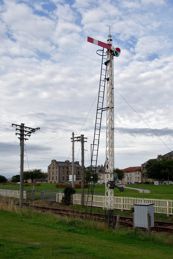 Home signal, Bo`ness 
 In the evening, in the hope of finding somewhere to eat, Andy and I went to Bo'ness. Whilst our efforts to find a restaurant of any type were thwarted, we did enjoy a lovely walk along the waterfront and around the Bo'ness and Kinneil Railway. With the Forth of Forth behind me, one of the railway's superb Caledonian Railway latticed signals is seen in the evening sun. 
 Keywords: Home signal Bo'ness