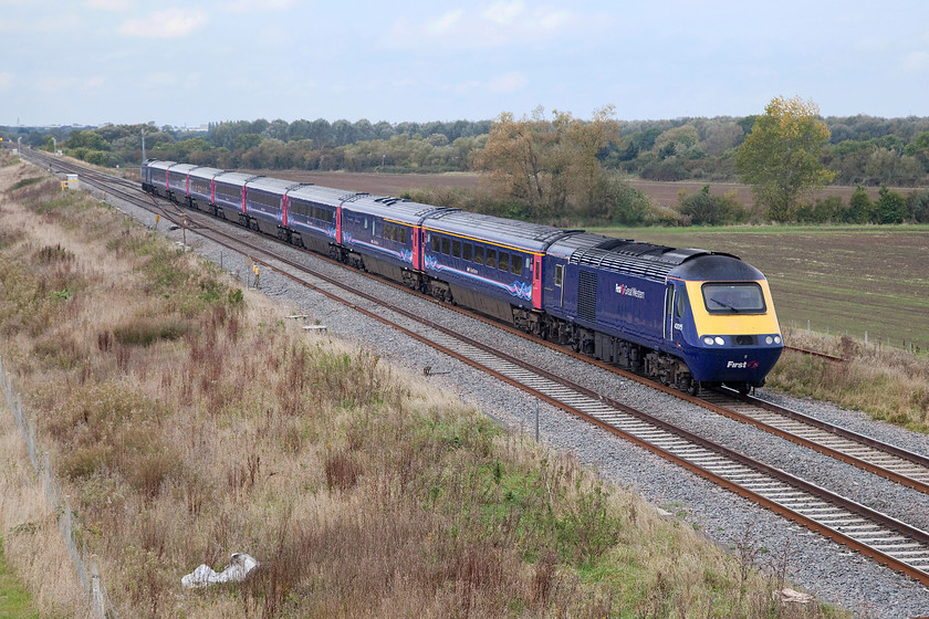 43015 & 43159, GW 11.58 Bristol Parkway-London Paddington (1L52), Bourton SU228874 
 43015 and 43159 power the 11.58 Bristol Parkway to London Paddington past the west Oxfordshire village of Bourton. Beyond the trees in the background is the growing town of Swindon. The large white building just above the rear power car is part of the huge Honda factory located on the old South Marston airfield. 
 Keywords: 43015 43159 11.58 Bristol Parkway-London Paddington 1L52 Bourton SU228874