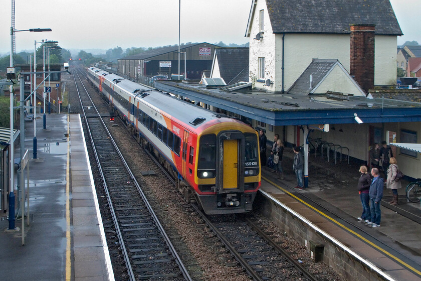 159108 & 159103, SW 09.26 Exeter St. David's-London Waterloo (1L26), Gillingham station 
 A busy scene at Gillingham (Dorset) station on a Saturday morning.159108. leads 159103 into the station working the 09.26 Exeter St. David's to Waterloo service. My wife, son and I took this train to Salisbury for a day out. I have travelled very little on the former L&SWR route, indeed, I believe that I have never travelled the lines west of Gillingham towards Exeter; something that needs rectifying. 
 Keywords: 159108 159103 09.26 Exeter St. David's-London Waterloo 1L26 Gillingham station SWT South West Trains