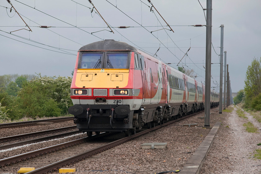 82230, GR 11.05 Leeds-London Kings Cross (1A26, RT), White House Crossing TL227777 
 DVT 82230 leads the 11.05 Leeds to King's Cross past White House Crossing near the small village of Abbots Ripton. Whilst it was bright, the sky looked threatening but only produced a few drops of rain now and again. 
 Keywords: 82230 1A26 White House Crossing TL227777