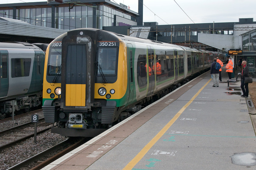 350251, LN 07.15 London Euston-Birmingham New Street (1Y05, 1E), Northampton station 
 Our first of three trains to Nottingham arrives into a gloomy Northampton station. Andy and I took 350251 to Birmingham New Street as the 07.15 ex Euston. As with so many trains at the moment, it was virtually empty meaning that social distancing was easy to manage. The train manager walked up and down the train indicating his presence but stated that London Northwestern's policy on ticket inspection was that it was at the train manager's discretion. This we found totally different to our next carrier from New Street - CrossCountry. 
 Keywords: 350251 07.15 London Euston-Birmingham New Street 1Y05 Northampton station