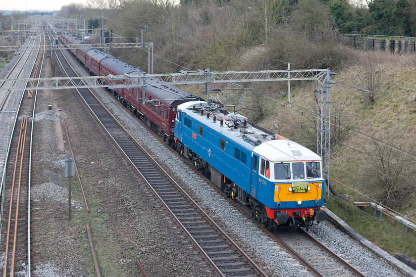 86259, outward leg of the Cumbrian Mountain Express, 07.10 London Euston-Carlisle (1Z86), Victoria bridge 
 86259 'Les Ross/Peter Pan' leads the 1Z86 07.10 Euston to Carlisle 'Cumbrian Mountain Express past Victoria Bridge in Northamptonshire. The electric hauled portion of the railtour gave way to steam haulage for the southward leg of the return journey from Carlisle to Crewe with haulage provided by 8P 4-6-2 46233 'Duchess of Sutherland'. 
 Keywords: 86259 the Cumbrian Mountain Express 07.10 London Euston-Carlisle 1Z86 Victoria bridge