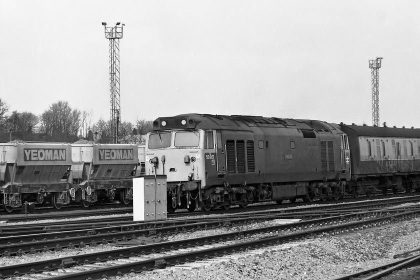 50017, 12.20 London Paddington-Paignton, Westbury South 
 At Westbury South 50017 'Royal Oak' passes leading the 12.20 Paddington to Paignton. Unfortunately, in my eagerness to get the shot I have placed it a little too late so part of the front is obscured by a relay box. Like a number of Class 50s, Royal Oak is preserved being, as of the beginning of 2019, owned by Michael Gregory and based at the Great Central Railway. 
 Keywords: 50017 12.20 London Paddington-Paignton Westbury South