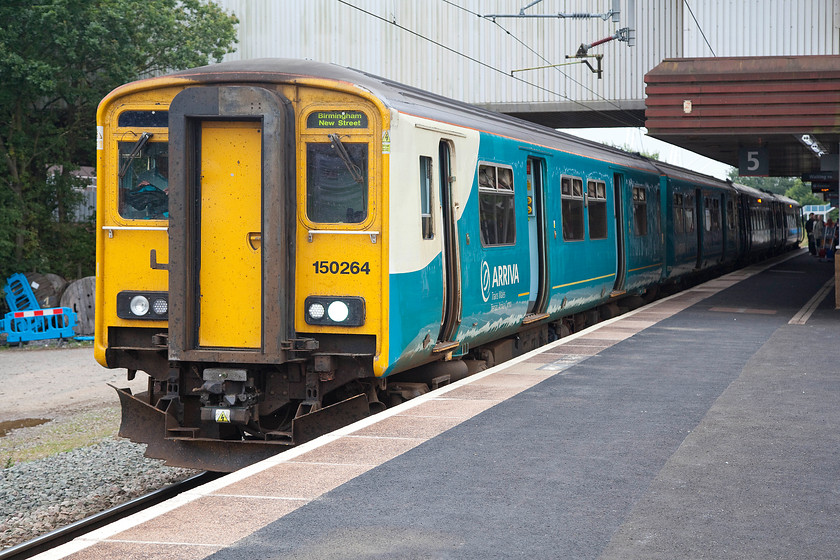 150264 & 158820, AW 16.09 Birmingham International-Aberystwyth & Pwllheli (1J23 & 2J23), Birmingham International station 
 Having arrived at Birmingham International on this train, within a few minutes, the crew had changed ends and the train was was being prepared to work back to Wales again, despite what the destination blind is saying! With 150264 leading 158820 the 16.09 to Aberystwyth and Pwllheli will leave platform five in about ten minutes. 
 Keywords: 150264 158820 16.09 Birmingham International-Aberystwyth & Pwllheli 1J23 2J23 Birmingham International station