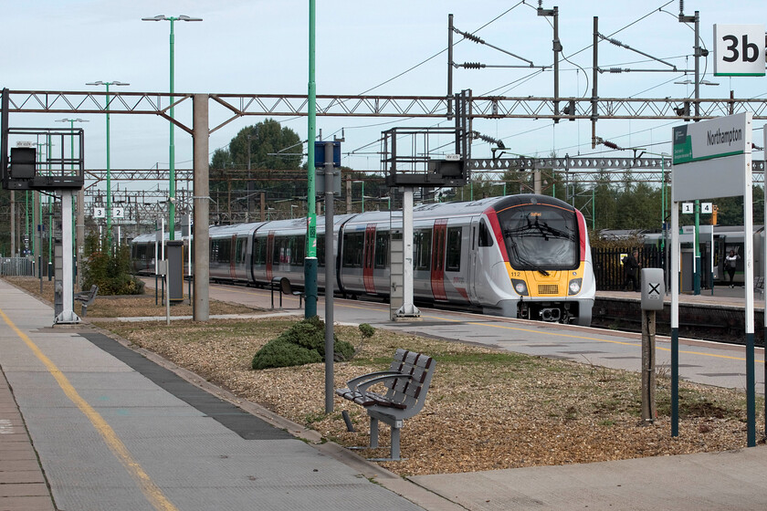 720112, 08.45 Wembley Yard-Rugby (5Q27, 36L), Northampton station 
 The Class 720s are a real step change for rail passengers throughout East Anglia on both the c2c and Greater Anglia lines replacing a myriad of older classes. The 720/1 subset is being introduced into service at the time of writing in the autumn of 2022 with units undergoing testing and mileage accumulation runs prior to moving east for driver training. Undergoing a test run 720112 is seen passing through Northampton station as the 5Q27 08.45 Wembley Yard to Rugby outward trip. It would make a return trip later in the day. This is a 'going away' shot as I was engrossed in conversation with my wife and enjoying a coffee on the train rather than studying RTT to see what was about! 
 Keywords: 720112 08.45 Wembley Yard-Rugby 5Q27 Northampton station Class 720 Aventra