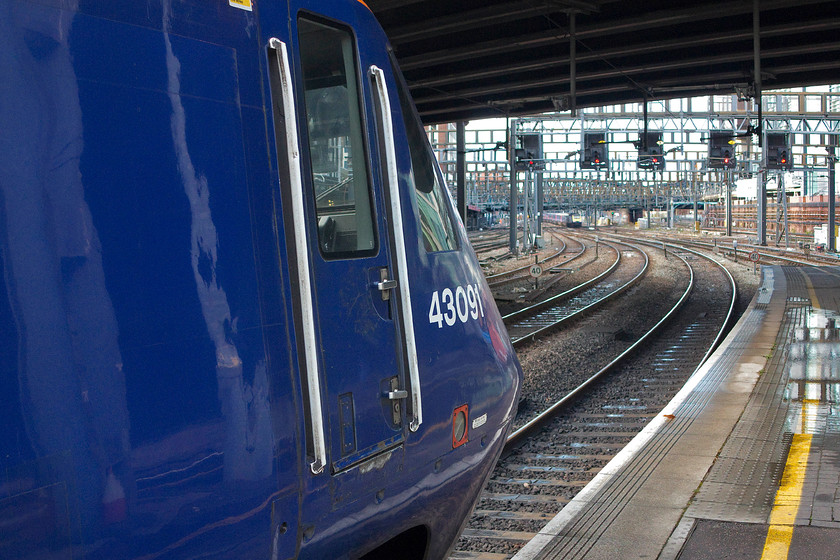 43091, GW 12.30 London Paddington-Swansea (1B35, 3L), London Paddington station 
 As it will have done thousands of times, 43091 waits to head west from London Paddington. Soon, this iconic image will be gone forever, perhaps with the exception of a charter, as the HSTs are withdrawn from service. 43091 was waiting to leave with the 12.30 to Swansea. 
 Keywords: 43091 12.30 London Paddington-Swansea 1B35 London Paddington station