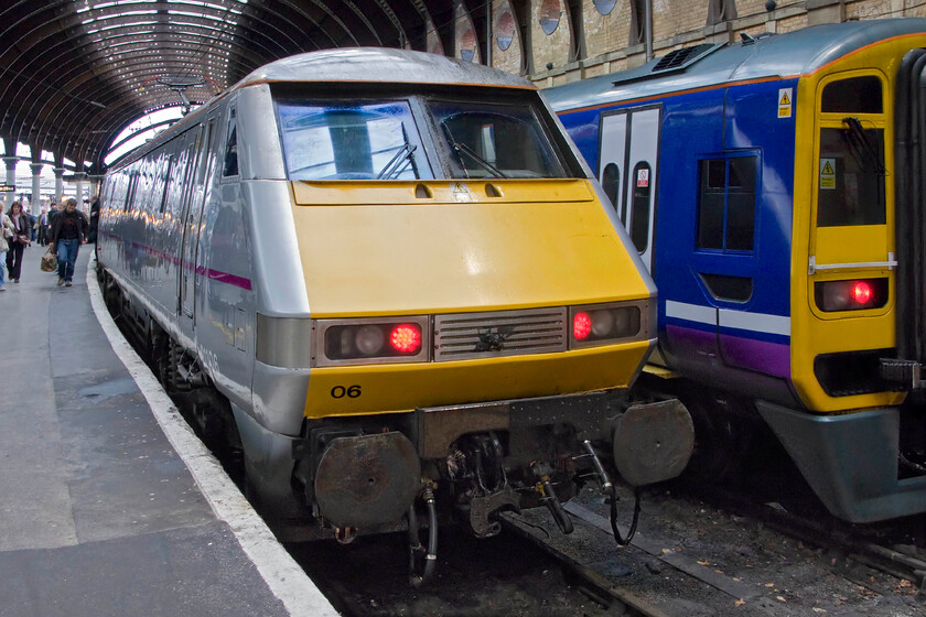 91106, GR 07.08 London KIng's Cross-York (1N80), York station 
 It looks as though 91106 has been in collision with a hapless bird on its journey north leading the 1N80 07.08 from King's Cross earlier in the morning! It is seen at York station to the rear of its return service next to a Northern Class 158 unit. 
 Keywords: 91106 07.08 London KIng's Cross-York 1N80 York station East Coast Class 225 InterCity