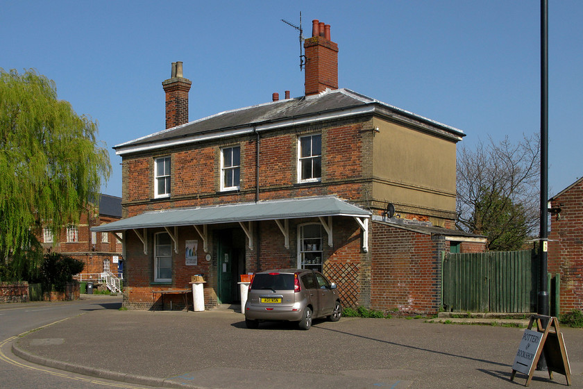 Frontage, former Wells-next-the Sea station (now bookshop) 
 The Old Station Pottery and Bookshop is housed in the former Wells-next-the-sea station building. The station closed to passengers in October 1964 and then to goods a month later. The current owners of the building have created a rambling bookshop and pottery studio that extends throughout the ground-floor rooms of the building. The rooms remain largely as they were when the station closed having had the minimal of restoration. 
 Keywords: Frontage former Wells-next-the Sea station now bookshop